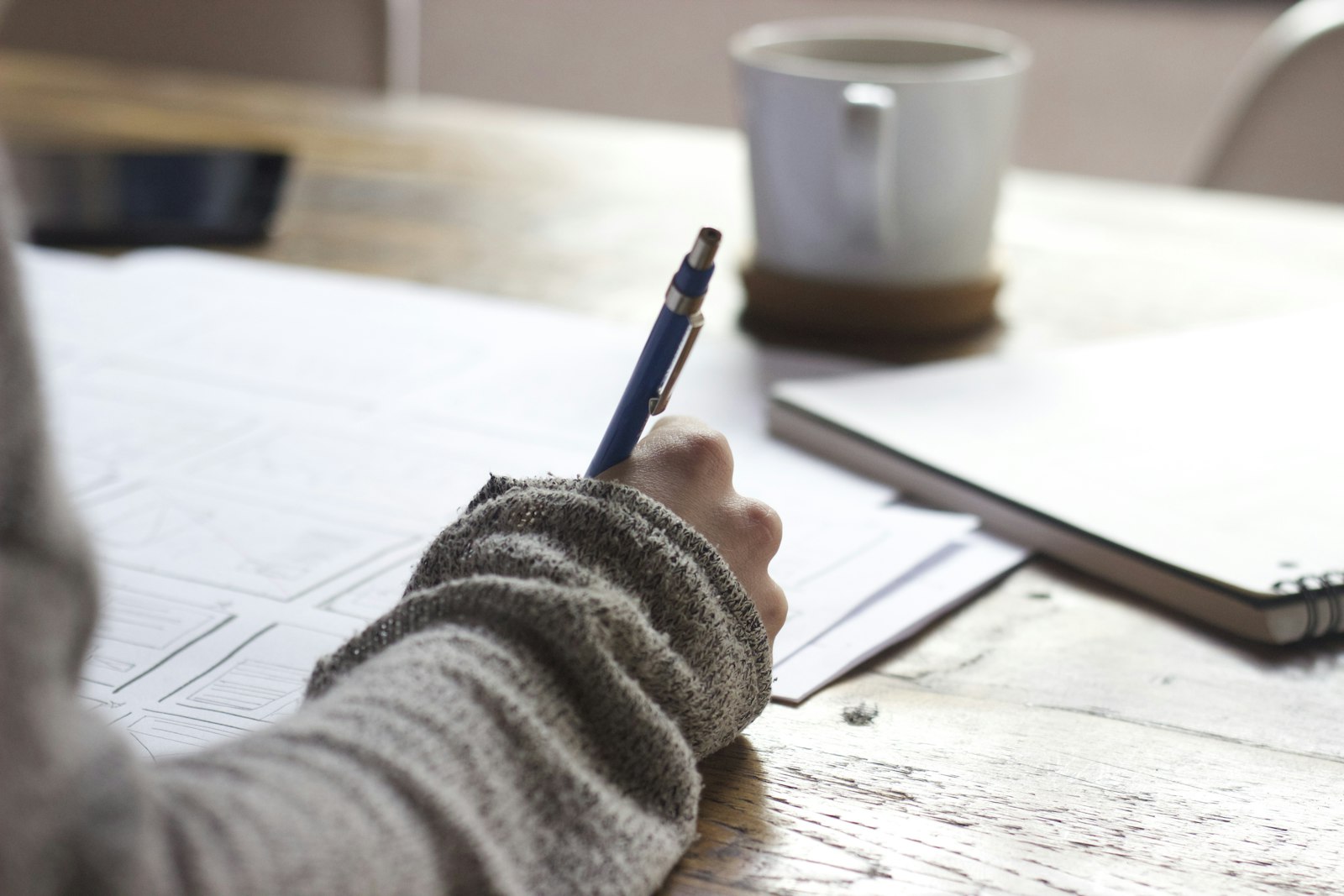 A student preparing an application at a desk